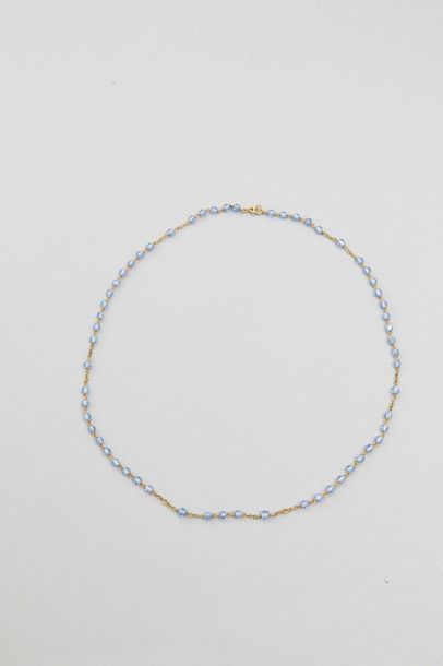 Necklace in 18k yellow gold with blue cut...