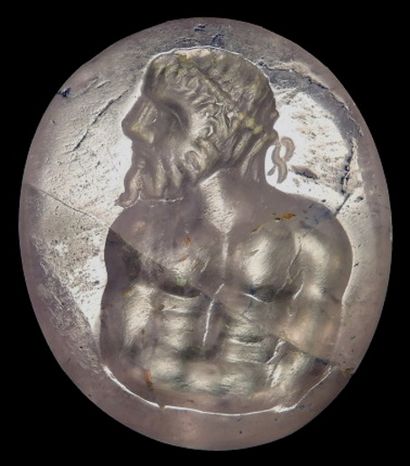 null Intaille ou médaillon gravé d’un buste d’Hercule. Epoque romaine. En l’état....