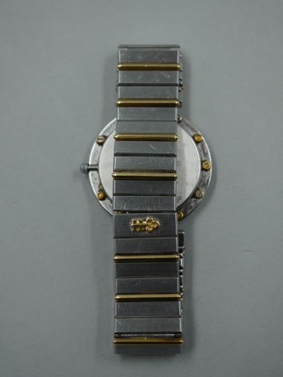 null CORUM - Montre bracelet de dame en acier et or jaune 18k - PB: 57,3gr