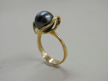 null 18k yellow gold ring with a Tahitian pearl 11mm diameter - PB : 7,42gr - TDD...