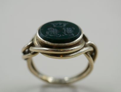 null A 14k yellow gold man's ring with scrolls set with a monogrammed blood jasper...