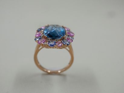 null 18k yellow gold ring surmounted by a blue topaz weighing approximately 7cts...