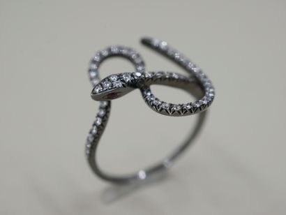 null Blackened 18k gold ring with a line of diamonds representing a snake - PB :...