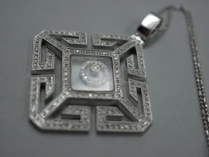 null Labyrinth pendant in 14k white gold paved with diamonds and centered with diamonds...