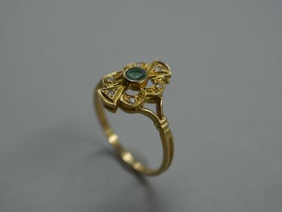 null 18k yellow gold ring with openwork bezel in the shape of a cartouche centered...