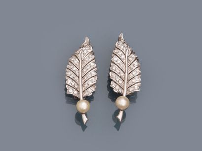 18k white gold leaf ear clips set with diamonds...