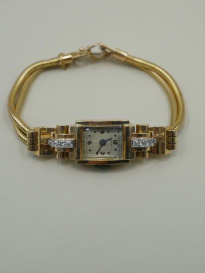 null Montre Turbogaz en or jaune 18k le cadran carré épaulé de godrons agrémentés...