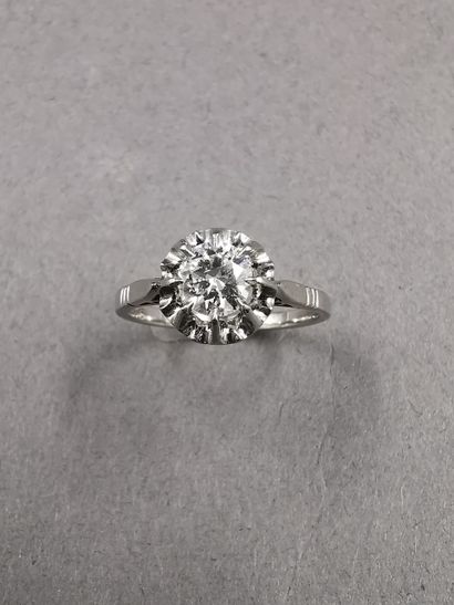 null Solitaire in platinum surmounted by a diamond of 0,55cts approximately - TDD...