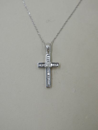 null Necklace chain in 18k white gold holding in pendant a cross paved with baguette...