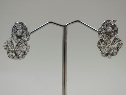null Pair of earrings with an openwork leaf design in 18k white gold set with diamonds...