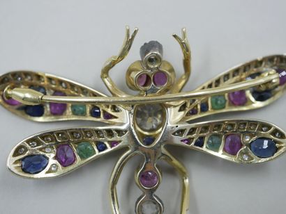 null 
Dragonfly brooch in 18k yellow gold and silver surmounted in its center by...