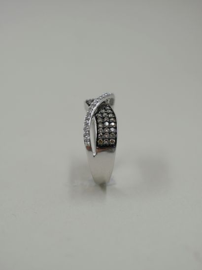 null Ring in grey and blackened 9k intertwined with two lines of paved diamonds and...