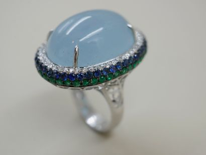 null 18k white gold ring with a large cabochon aquamarine of about 20cts surrounded...