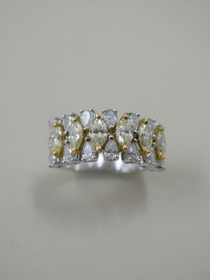 null Band ring in 18k white gold set with 6 pale yellow navette diamonds alternated...