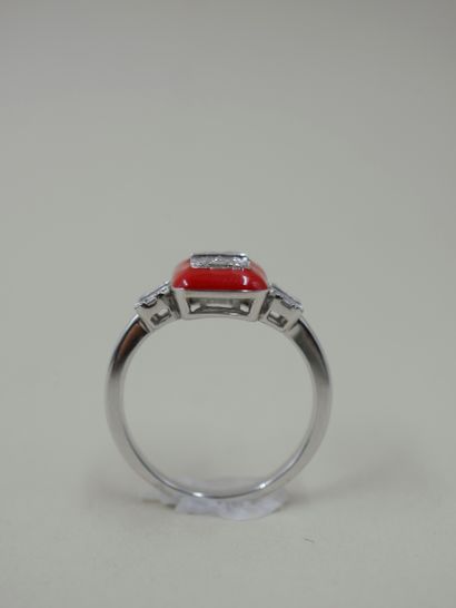 null Ring in 18k white gold with red enamel, decorated with baguette and round diamonds,...
