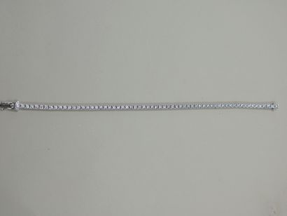 Bracelet ligne articulé en or gris 18k serti...