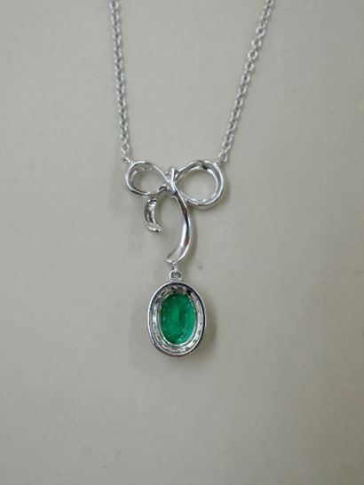 null Necklace in 18k white gold holding in pendant a bow paved with brilliants and...