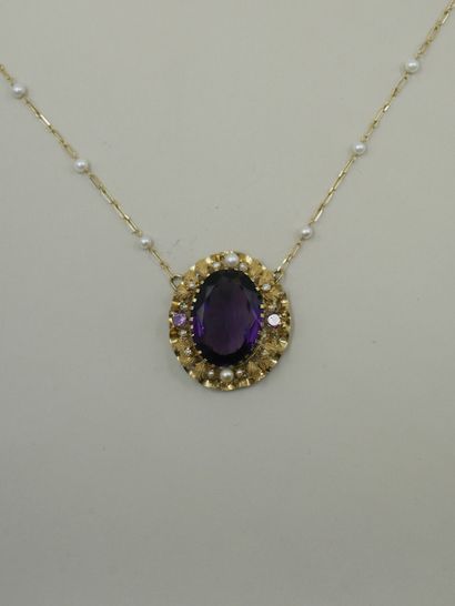 null 18k yellow gold pendant surmounted by an important oval amethyst of 30cts in...
