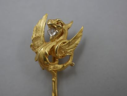 Tie pin in 18k yellow gold with a chimera...