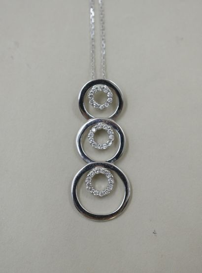 null Necklace in 18k white gold holding a pendant with three circles in fall paved...