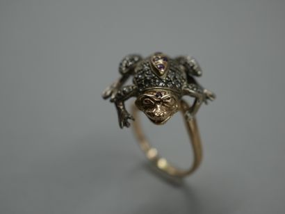 null Original ring in yellow gold and silver surmounted by a mobile frog paved with...