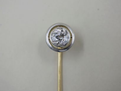 null White gold tie pin with a diamond of 0,70cts - PB : 3,60gr