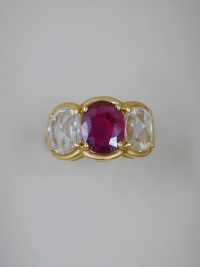 null 18k yellow gold ring set with a beautiful oval ruby weighing about 2cts and...