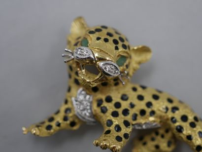 null Leopard" brooch in 18k yellow gold with black enamel and set with diamonds and...