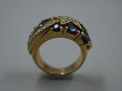 null Band ring in 18k yellow gold surmounted by a shooting star motif paved with...