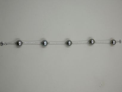 Bracelet in 18k white gold with five Tahitian...