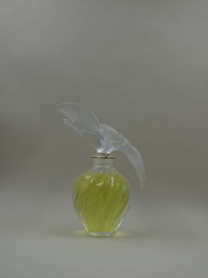 null NINA RICCI " L'air du temps

Crystal bottle, stopper with two doves with spread...