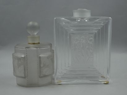 null Set of 2 bottles including 1 Lalique bottle with farandole decoration and 1...