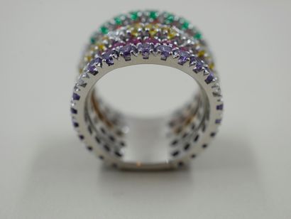 null Band ring in 18k white gold set with lines of purple, pink, yellow, orange and...