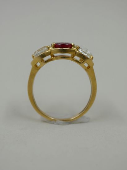 null 18k yellow gold ring set with a beautiful oval ruby weighing about 2cts and...