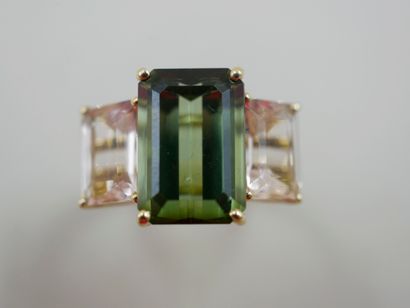 null 18k yellow gold ring set with a rectangular tourmaline of about 5 ct. and two...