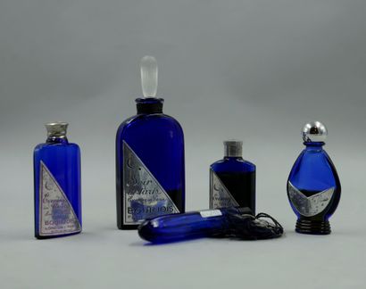 null BOURJOIS "Soir de Paris

Lot of 5 bottles including 4 blue glass bottles, titled...
