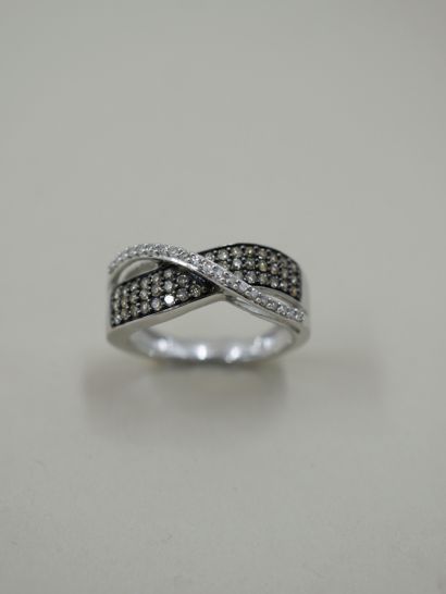 null Ring in grey and blackened 9k intertwined with two lines of paved diamonds and...