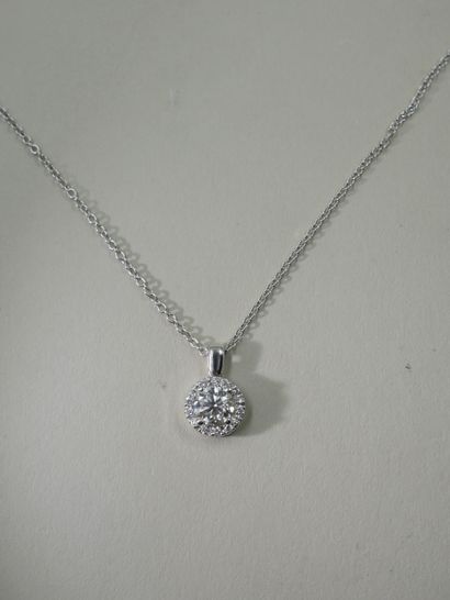 null Necklace in 18k white gold holding in pendant a round diamond of 0,70cts of...