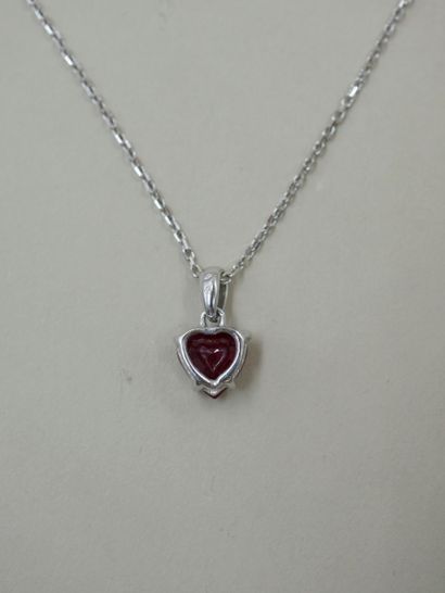 null 18k white gold necklace holding a pendant set with a probably Burmese heart-shaped...