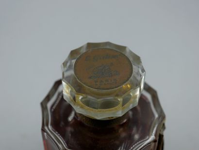 null LE GALION "Sortilège

Large glass bottle, titled label. Nut-shaped stopper (blocked)...