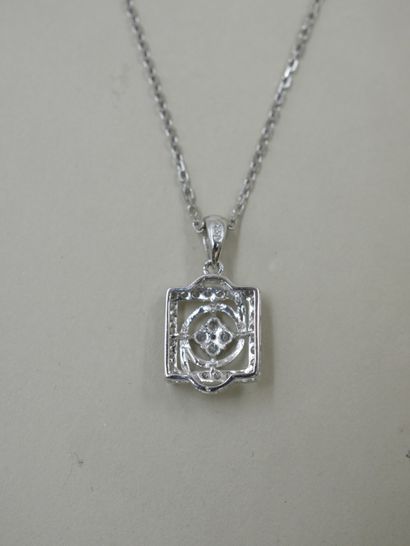 null Necklace in 18k white gold holding a square openwork pendant paved with diamonds...