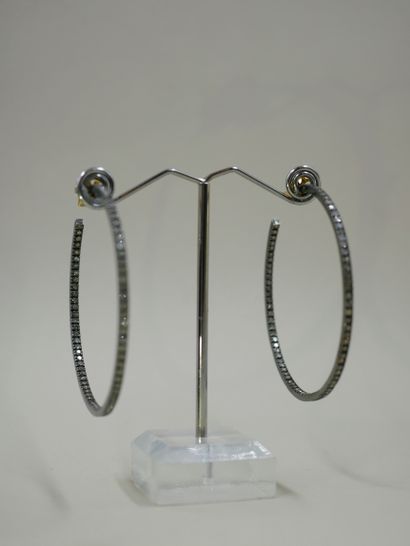 null Pair of large 14k yellow and blackened gold hoop earrings, paved with diamonds....
