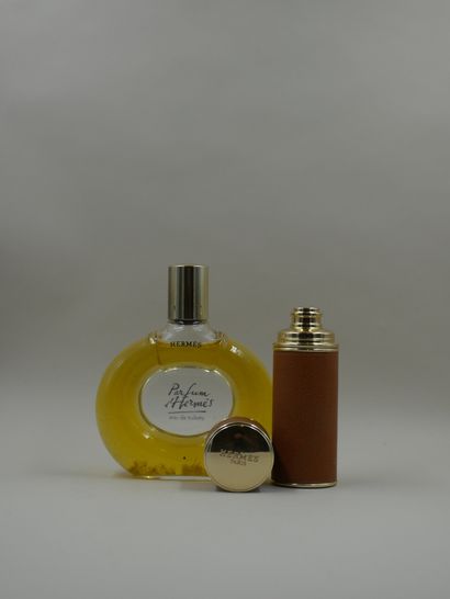 null HERMES

Leather spray case + empty glass bottle "Parfum d'Hermès".

Height of...