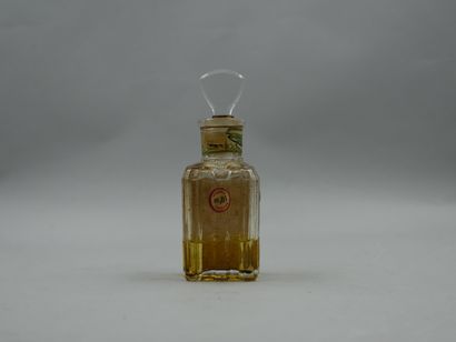 null L.T. PIVER "Floramye

Glass bottle with decorated and titled label, triangular...