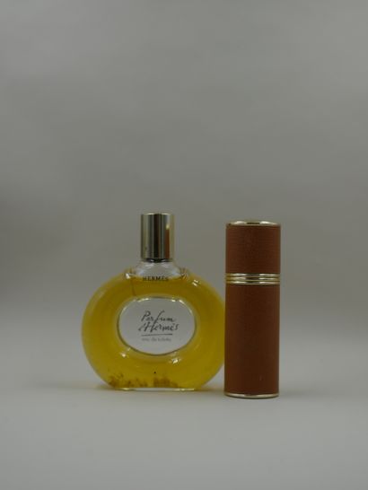 null HERMES

Etui d’atomiseur en cuir + flacon « Parfum d’Hermès » en verre, vide.

Hauteur...