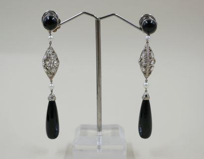 null Art deco style earrings in 18k white gold consisting of an openwork drop set...