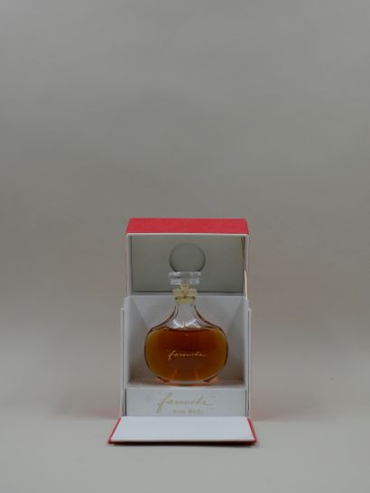 null NINA RICCI "Fierce

Glass bottle. Lalique crystal stopper. Titled in gold letters...