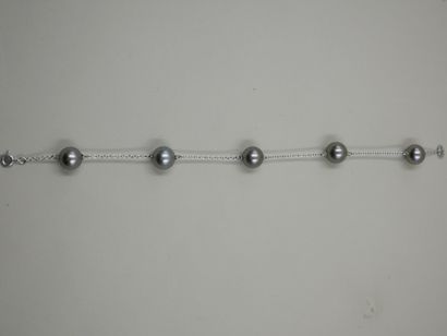 null Bracelet en or gris 18k agrémenté de cinq perles de culture de Tahïti - PB :...