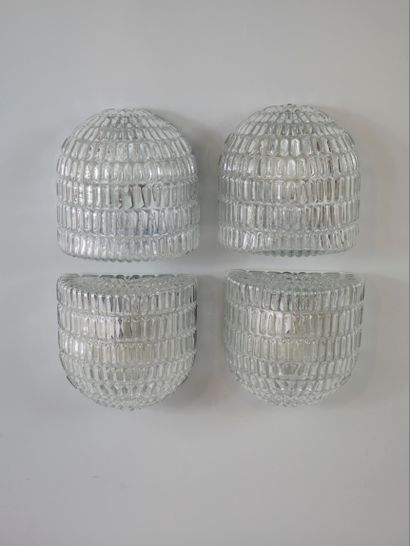 null Suite of four wall lights, in moulded glass and white lacquered metal. Size:...