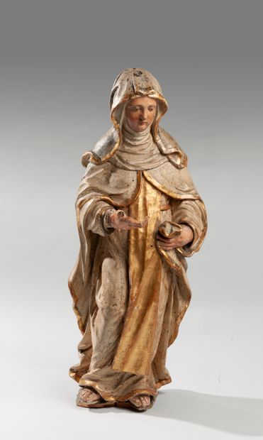 null Sculpture en bois polychrome et doré représentant une sainte femme vêtue d'un...